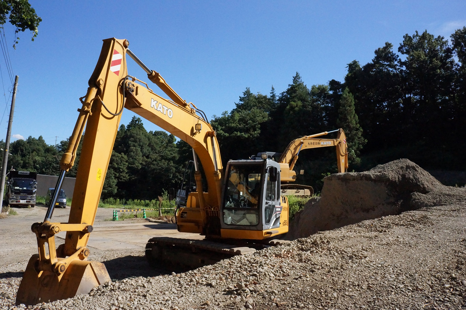 ダンプに愛着を持って手入れしているKさん